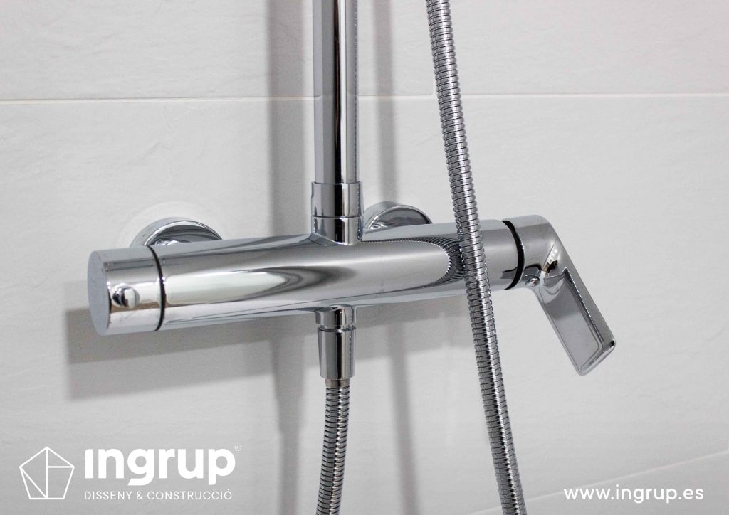17 detalle mando ducha griferia cromado ingrup estudi diseno construccion retail granollers barcelona